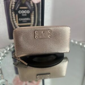 Kate Spade Shimmering Gold zipper round wallet